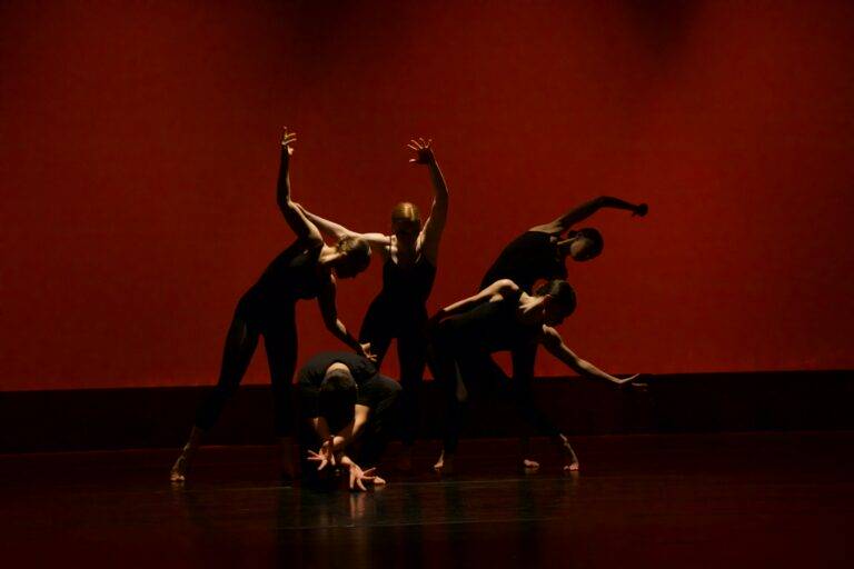 group of people performing on stage